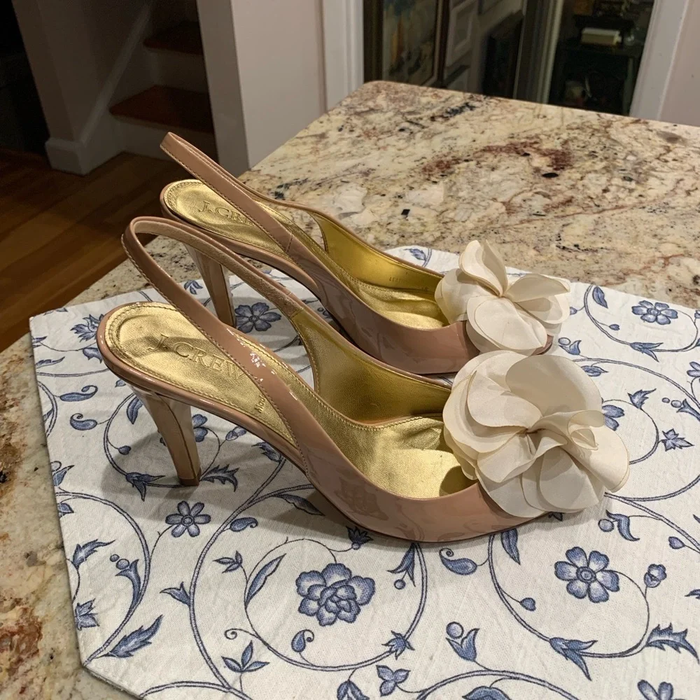 J.Crew slingback patent leather pumps with a decorative flower detail